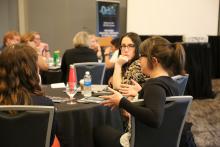 Fellows discuss during group debriefs